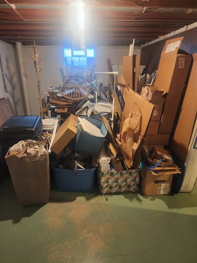 Roll-off dumpster container at job site for 4 Yard Dumpster Rental in Milan